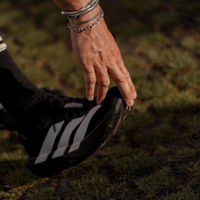 Hands of a person preparing for a morning activity.